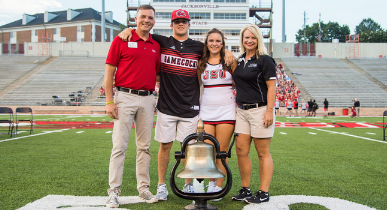 Terry Casey, his son Colin, Kaci Ogle, and her daughter Abbey